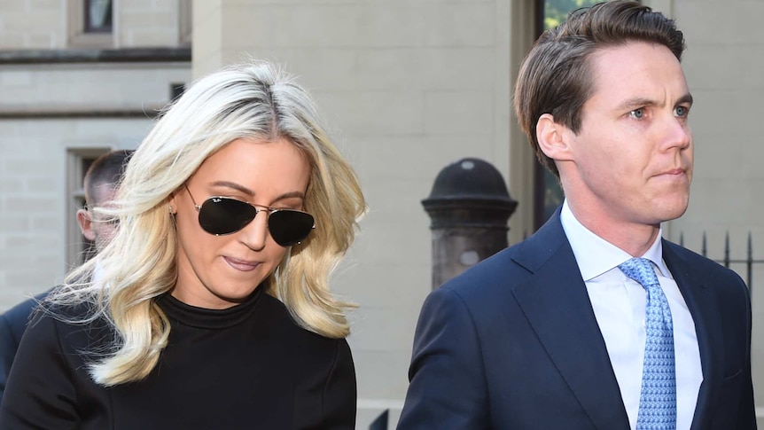 Sydney investment banker Oliver Curtis (right) arrives with his wife Roxy Jacenko at the Supreme Court in Sydney