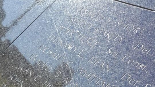 Scratches on the NSW Police Force Wall of Remembrance in Sydney