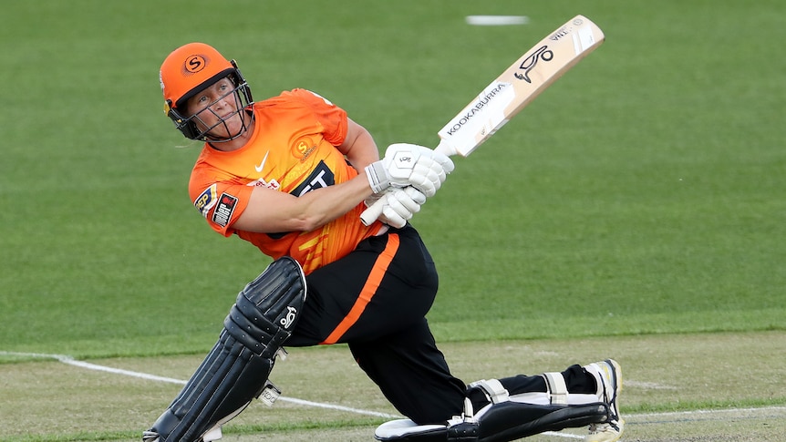 A Perth Scorchers WBBL batter watches the progress of a shot played to the leg side.