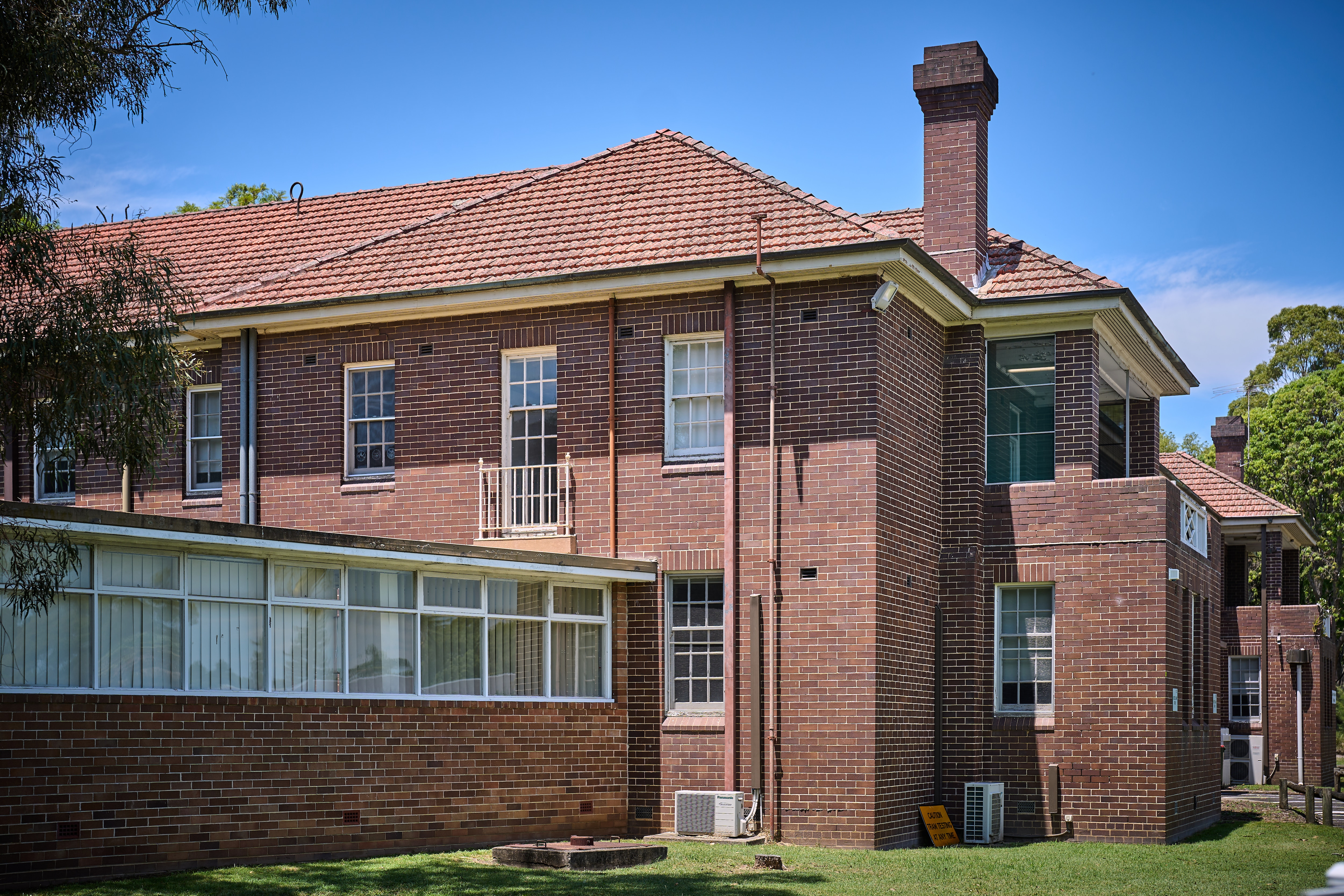 A two-storey, red-brick building.
