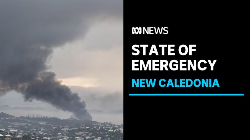 State of Emergency, New Caledonia: An aerial image of smoke rising off the roof of houses