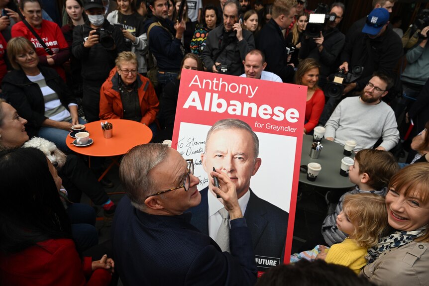 the newly elected prime minister of australia anthony albanese with labor party members in marrickville the day after election
