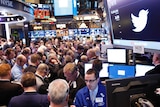 Traders crowd the floor of the New York Stock Exchange ahead of the Twitter IPO on November 7, 2013.