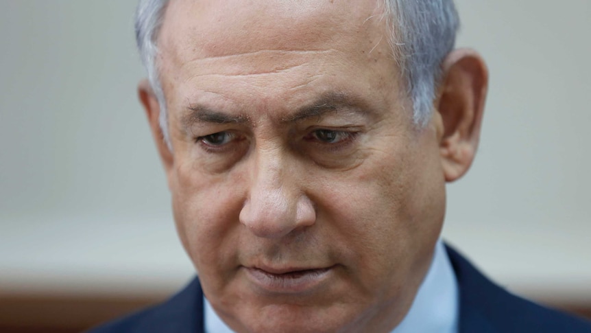 Tight shot of Benjamin Netanyahu looking towards the ground.