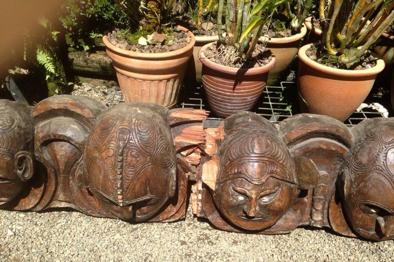Carved heads that were removed from the lintel of PNG's Parliament by the speaker.