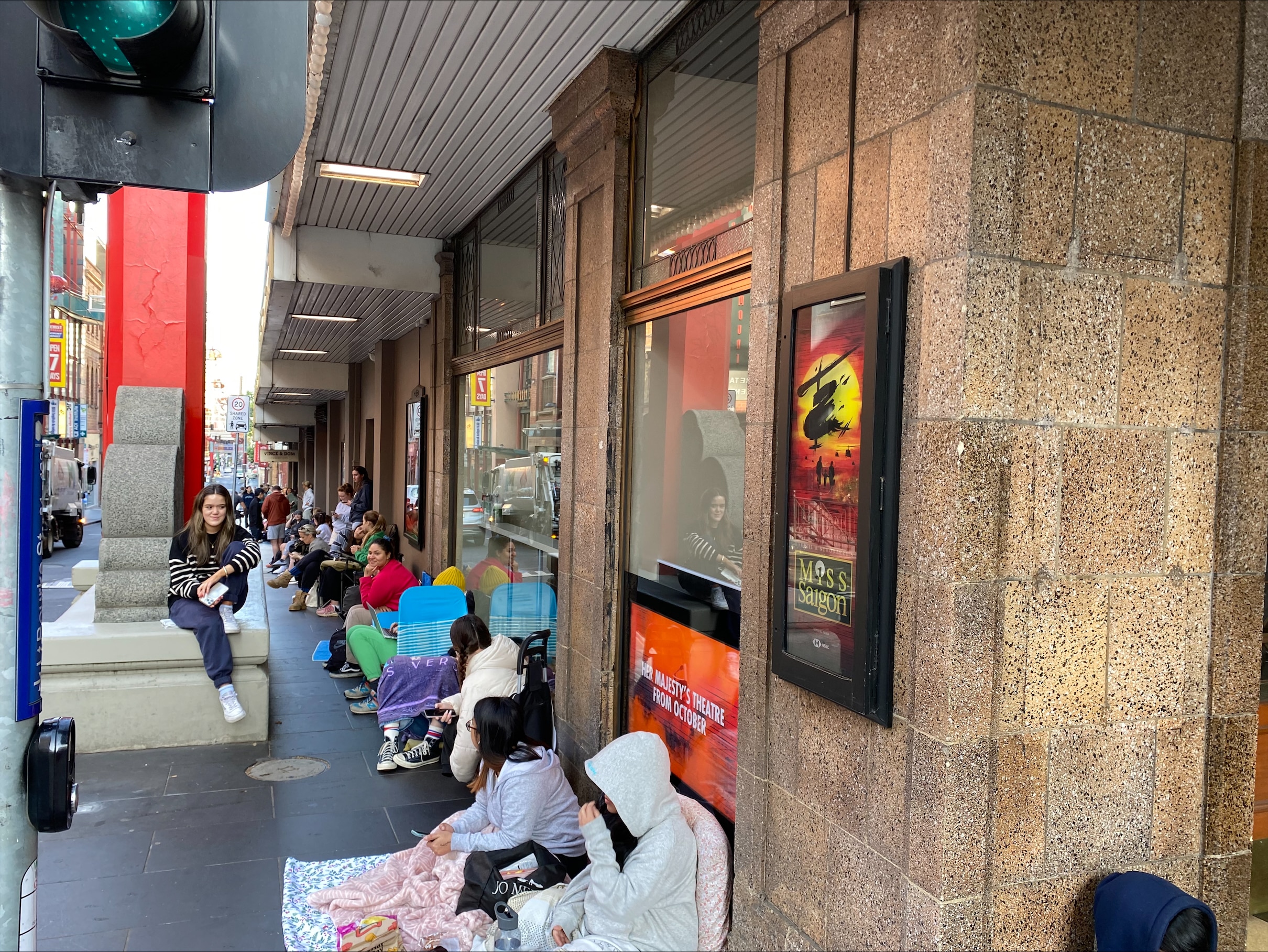 People sitting on the ground.