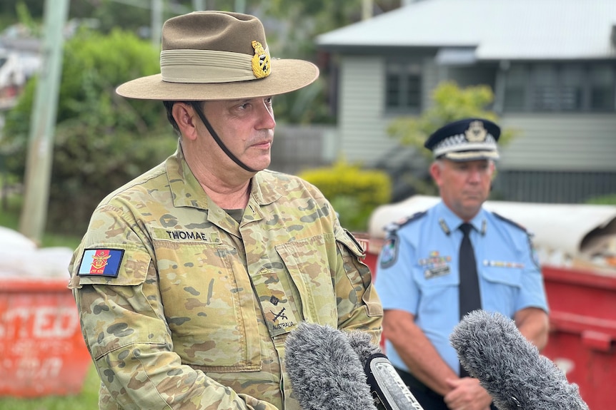 Flood recovery coordinator Major General David Thomae with police deputy commissioner Shane Chelepy