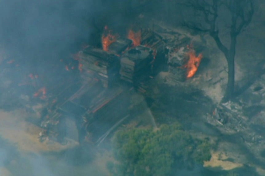 Property on a rural block smoulders after a fire tore through the area.