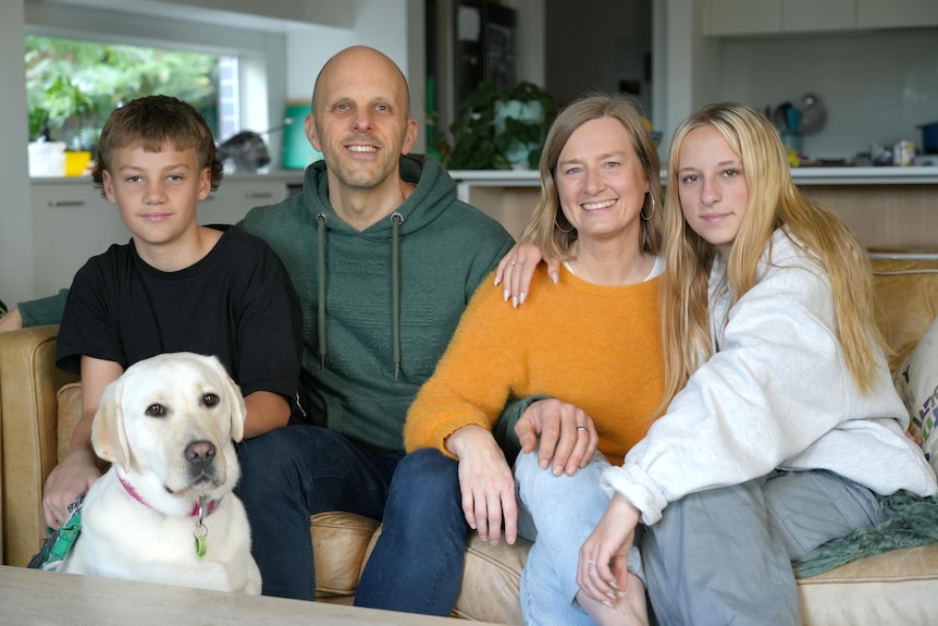 Tony with his son, wife, daughter and dog