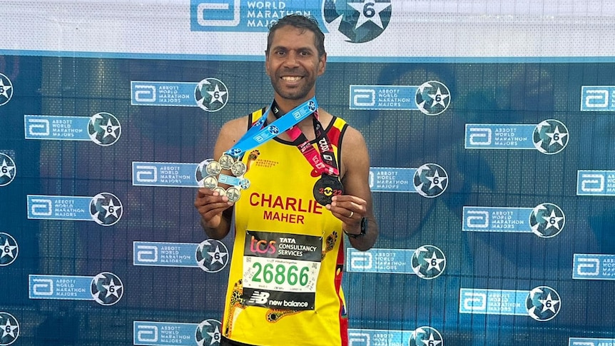 Western Arrente man Charlie Maher completes sixth major marathon in 12-year running journey