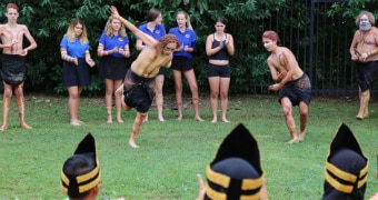 Students are watching Aboriginal dance