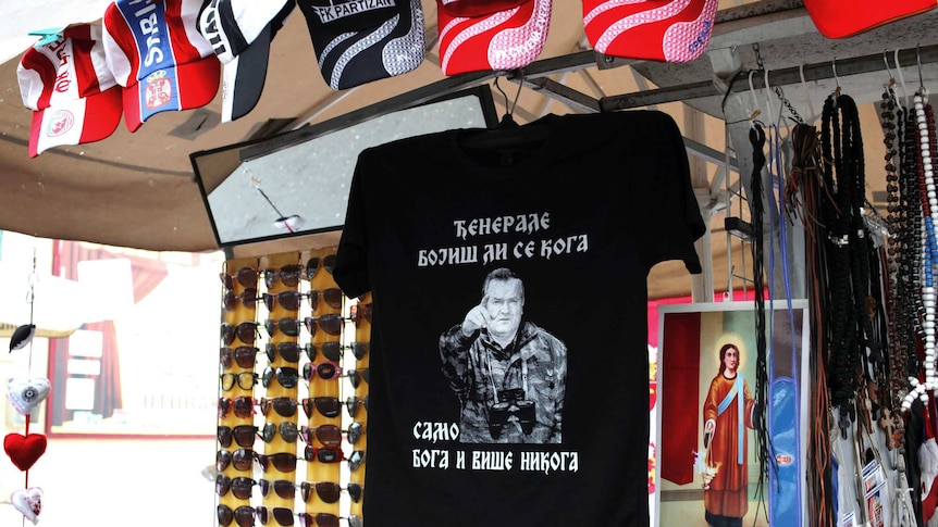 Religious icons of the Serbian Orthodox Church sell beside a t-shirt of General Ratko Mladic.
