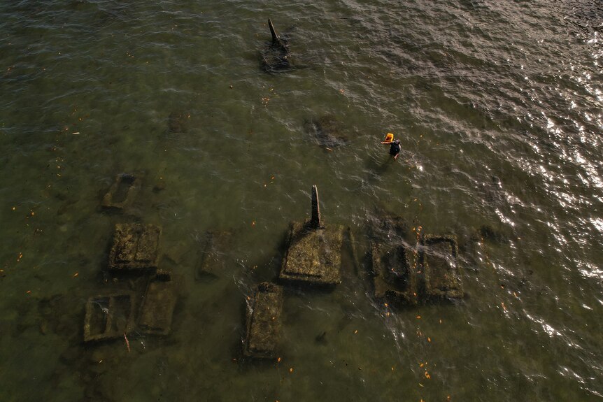 Aerial view of a graveyard submerged by water 
