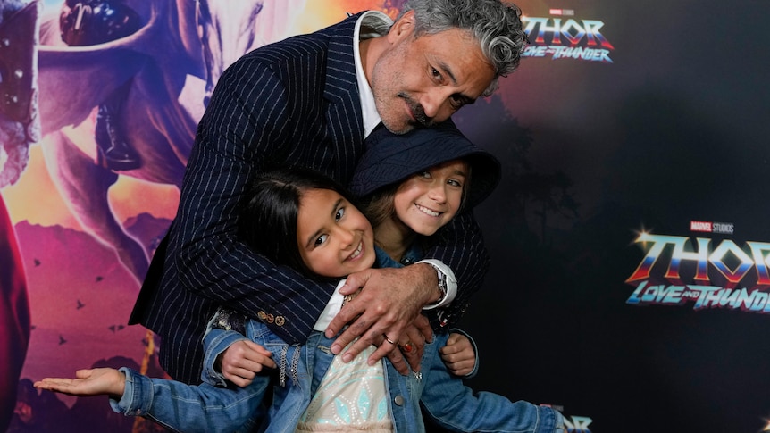 Taika Waititi with his daughter's for the movie premiere of Thor: Love and Thunder in Sydney.