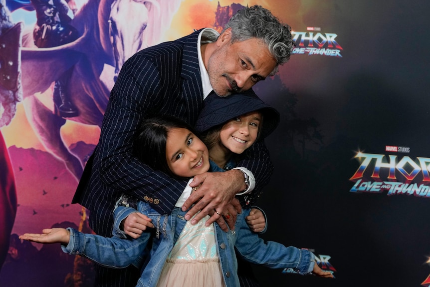 Taika Waititi with his daughter's for the movie premiere of Thor: Love and Thunder in Sydney.