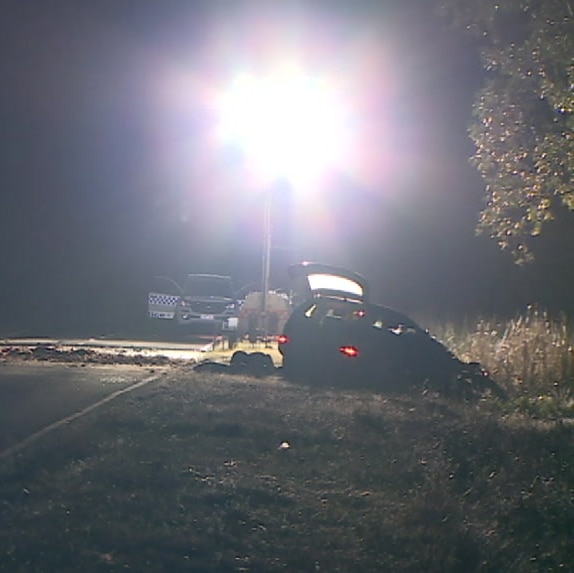 A truck, car and police car are shown at the scene of the crash in Brimin, north-east Victoria.