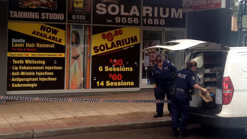 Tanning salon sprayed with bullets