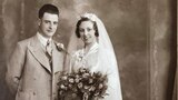 An old sepia photo of a bride and groom. 