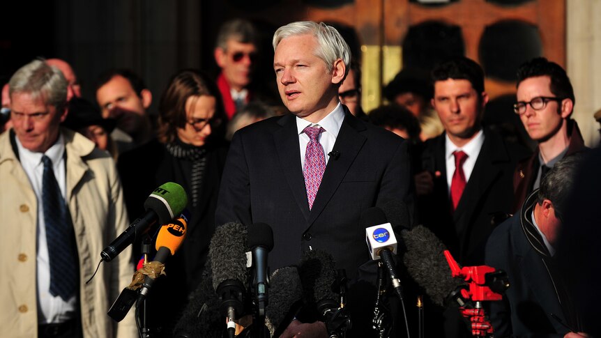 WikiLeaks founder Julian Assange speaks to the media after leaving the High Court