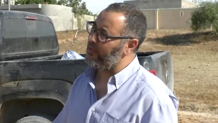 Ramadan Abedi, Salman Abedi's father, speaks to someone outside.