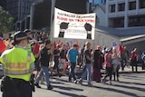 Protesters rally against PNG asylum seeker deal in Brisbane