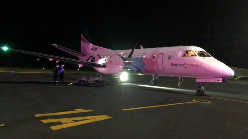 A small plane on a runway