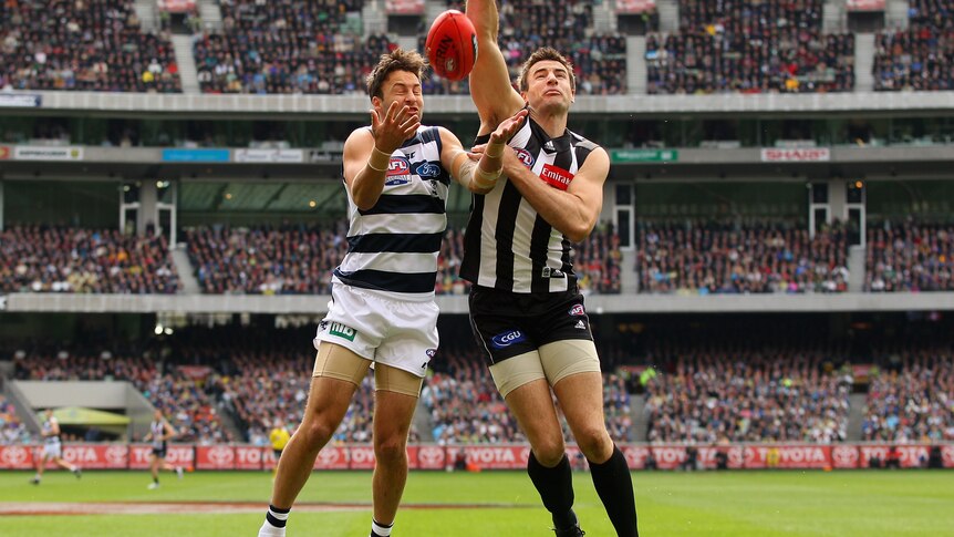Darren Jolly (r) and Jimmy Bartel are big inclusions for their sides.