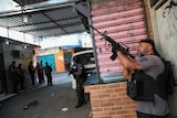 A police officer holding a gun