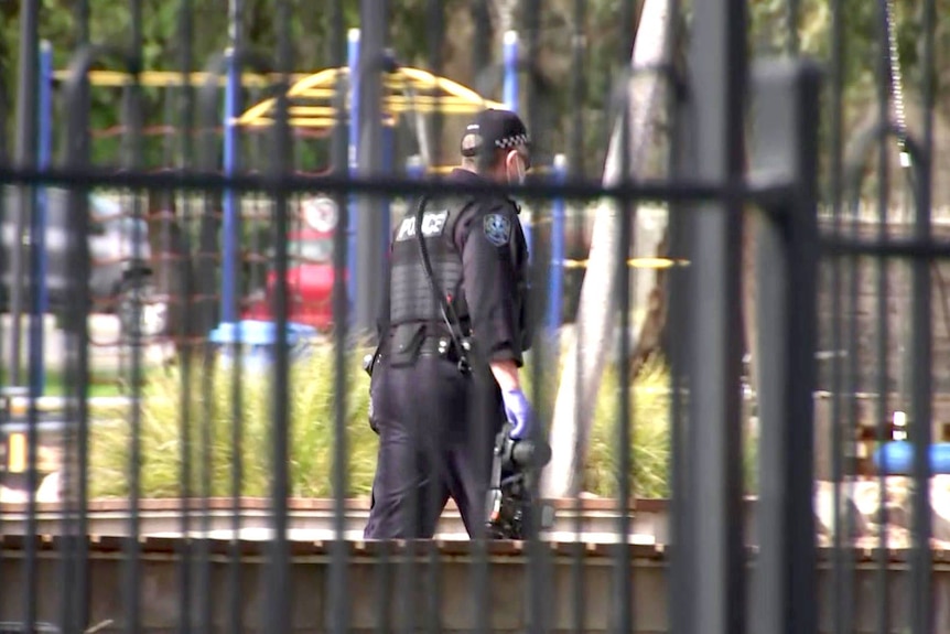 A police officer at a school.