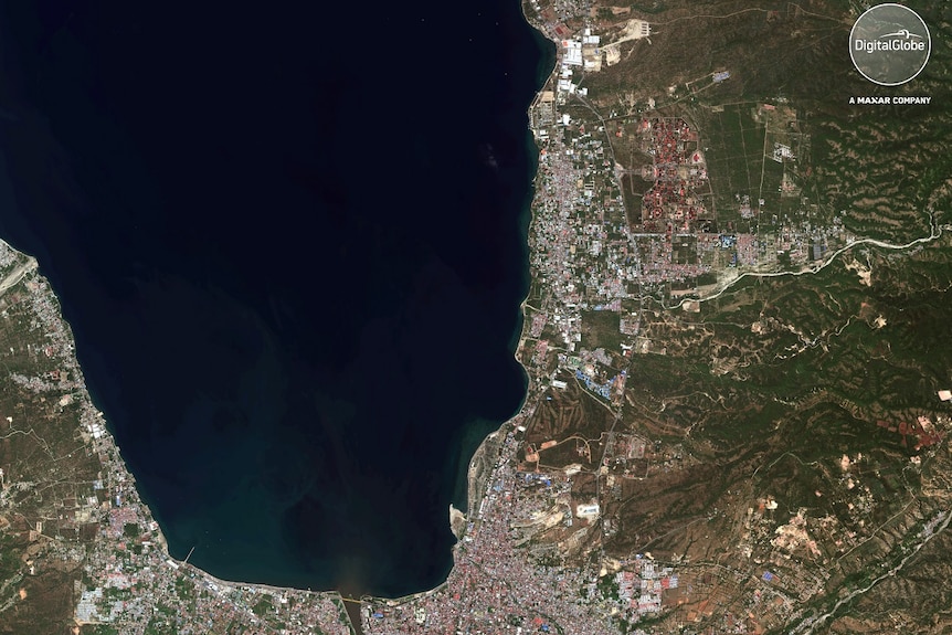 This August 17, 2018, satellite photo provided by DigitalGlobe shows a view of the Palu, Indonesia.
