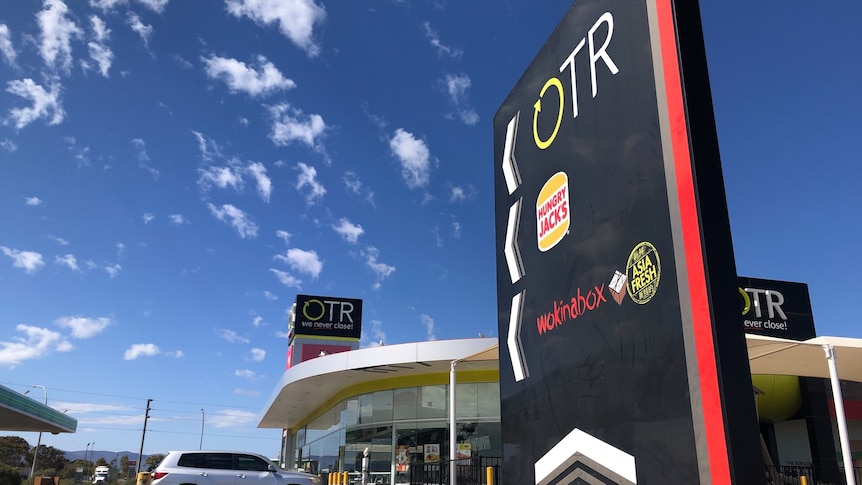 service station with blue sky in the background