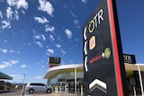 service station with blue sky in the background