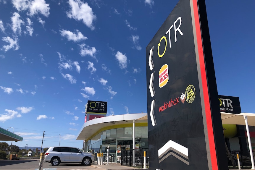 service station with blue sky in the background