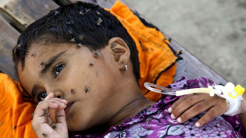 A child receives medical treatment at a local hospital in Pakistan's Muzaffargarh district