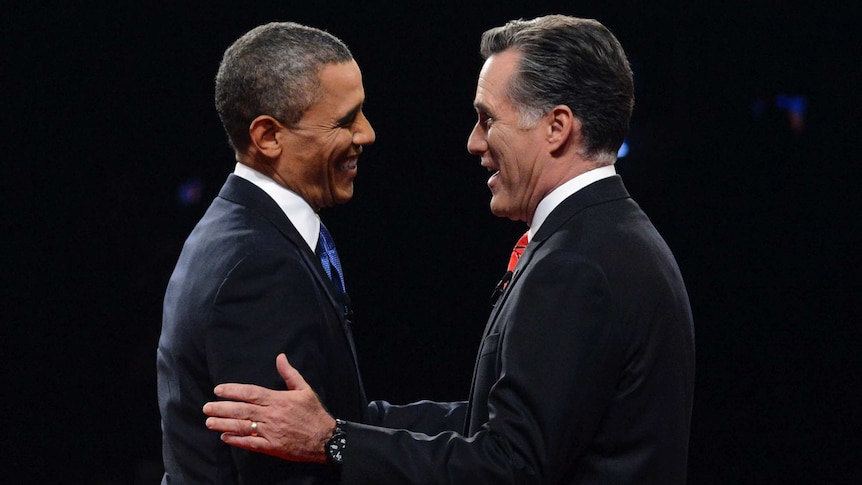Mitt Romney greets Barack Obama at the start of the presidential debate.