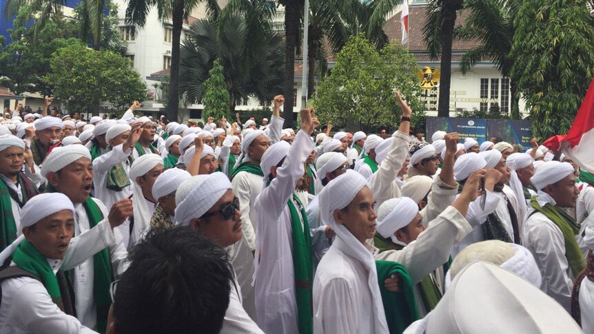 An angry group of Islamic Defenders Front members participate in protests in Jakarta.
