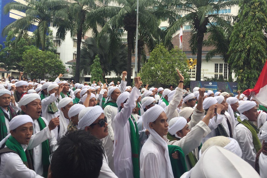 An angry group of Islamic Defenders Front members participate in protests in Jakarta.