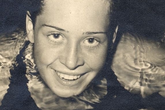 Sandra Morgan-Beavis smiling in the water in a black and white photo