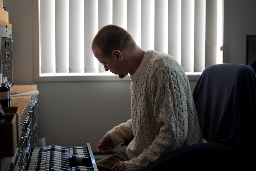 Paul Blamire looks for flavourings in his home office.