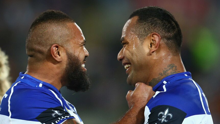 All smiles ... Frank Pritchard (L) celebrates with Tony Williams after he scored a try