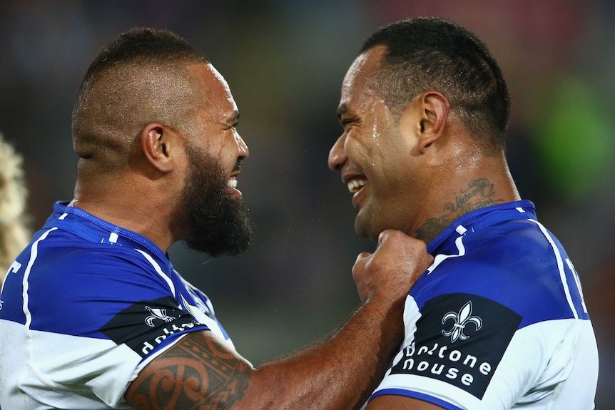 All smiles ... Frank Pritchard (L) celebrates with Tony Williams after he scored a try