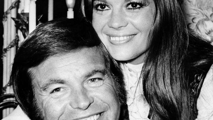 Actor Robert Wagner and actress Natalie Wood pose at the Dorchester Hotel in London.