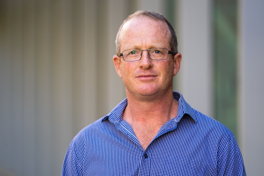 RSL WA vice president Duncan Anderson wears a blue shirt and looks directly at the camera