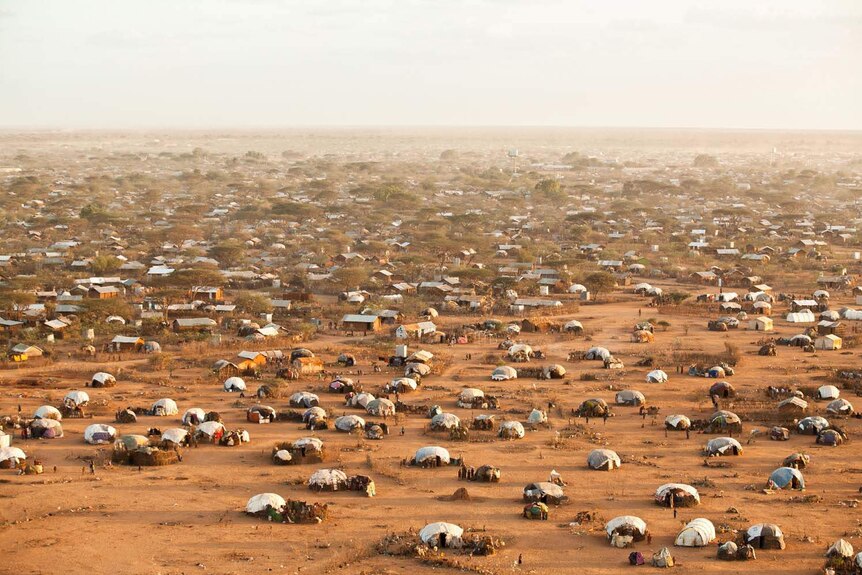 Aerial shot of the UNHCR Refugee camp in Dadaab in Kenya, with hundreds of tents in the desert.