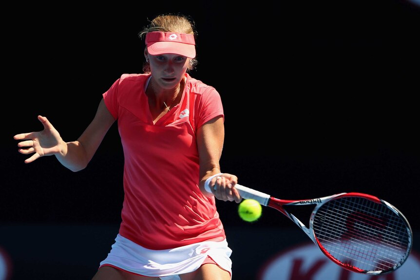 Russian Ekaterina Makarova plays a forehand against Angelique Kerber in the fourth round.