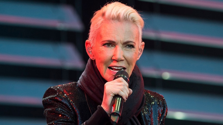 Marie Fredriksson, singer of the pop duo Roxette singing on stage.