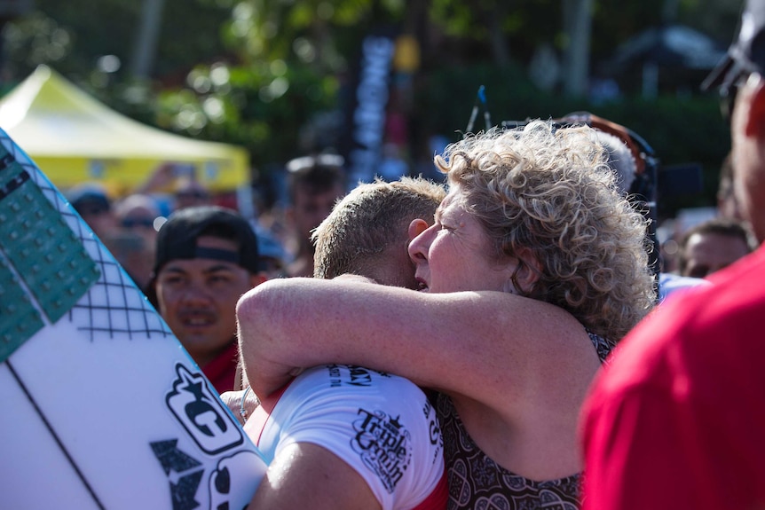 Mick Fanning hugged by his mum