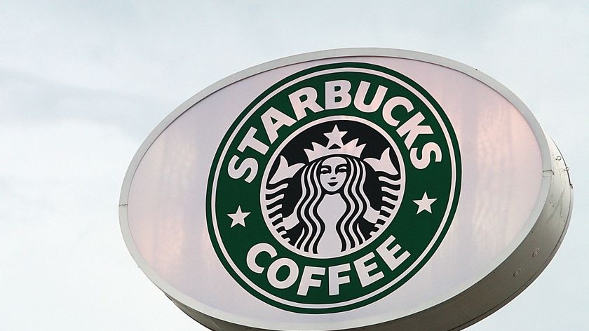 A sign for Starbucks coffee