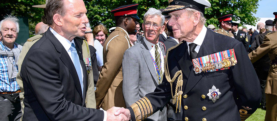 Tony Abbott greets Prince Philip following a British D-Day commemoration ceremony in northern France on June 6, 2014.