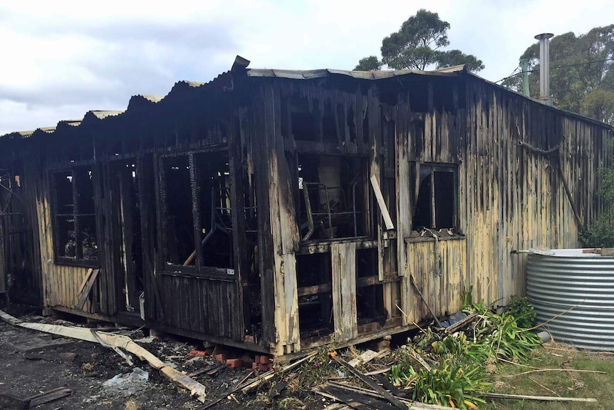 Burnt out shack at Primrose Sands
